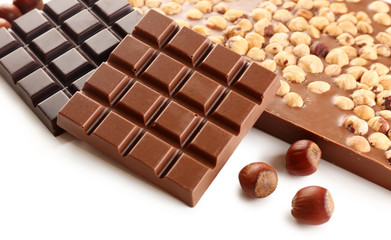 Chocolate bars with hazelnuts close up