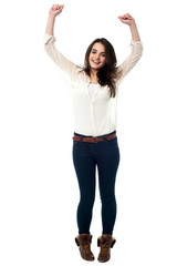 Obraz premium Teen girl dancing on the tune