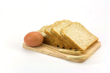 bread and egg isolated on white background