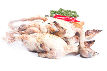 quail and spices Before cooking isolate on white