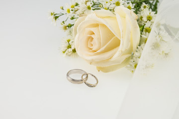 Wedding ring with White rose and cutter flower on wedding veil