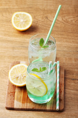 cold soft drink from apple syrup and mint