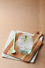 cold soft drink from apple syrup and mint