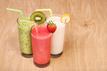 healthy glass of smoothies collection flavor on wood background
