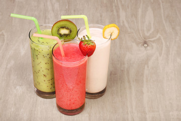 healthy glass of smoothies collection flavor on wood background