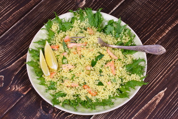 Cous cous salad with salmon