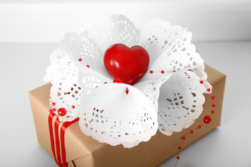 Beautiful gift box on wooden background. Valentine Day concept