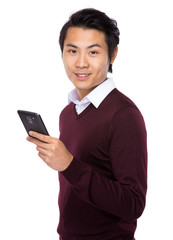 Young businessman using a mobile phone