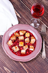 Fried pork with cranberry and wine sauce
