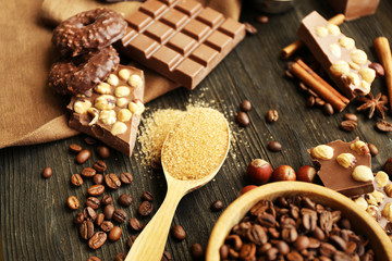 Fototapeta na wymiar Still life with set of chocolate, nuts and spices