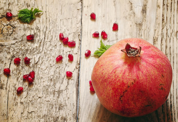 pomegranate with seeds and leaves