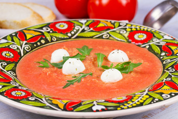 Red lentil and tomato soup with mozzarella