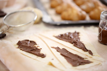 Making croissant cookies.