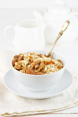 Oatmeal flakes with nuts in bowl