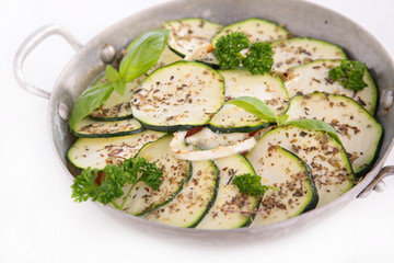 pan with courgette and herbs