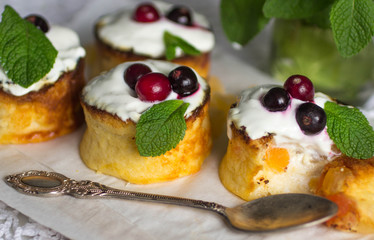 Curd pudding with candied fruit and fresh berries
