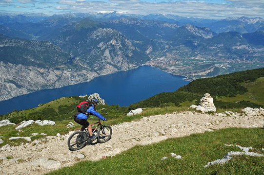 Mountainbiker at the trail near Garda Lake,Italy