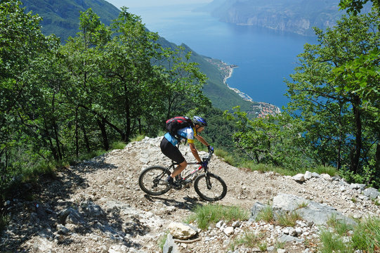 Mountainbiker at the trail near Garda Lake