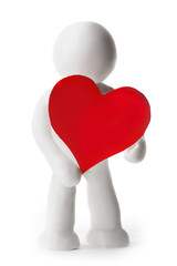 Plasticine man holding heart