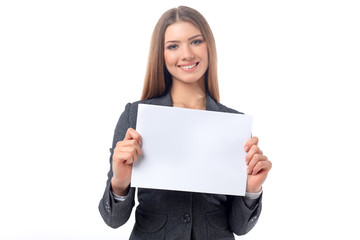 Naklejka premium Businesswoman holding a blank sheet of paper