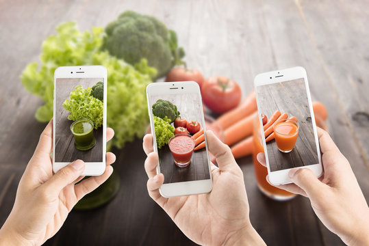 Taking photo of vegetable Juices with fresh ingredients.
