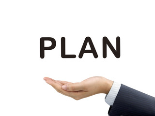 plan word holding by businessman's hand