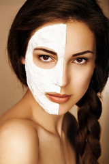 Woman getting spa treatment. Facial mask