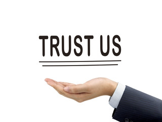 trust us words holding by businessman's hand