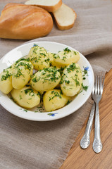 Boiled potatoes and bread