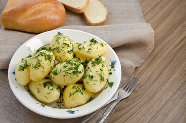 Boiled potatoes and bread