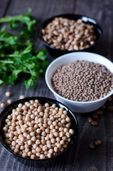 chickpeas, beans and lentils in bowls