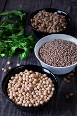 chickpeas, beans and lentils in bowls