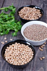 chickpeas, beans and lentils in bowls