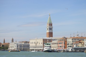 view of Venice and the bell tower of San Marco from the lagoon