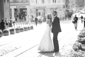 Lovely couple hugging in the city