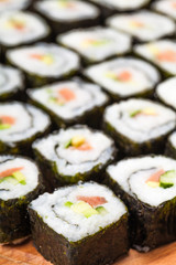 many rolls with salmon close-up