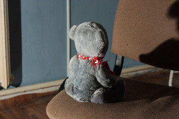 Lonely forsaken abandoned toy bear