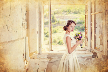 Young woman with bouquet flowers in old room at open window.