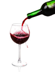Red wine pouring on white background