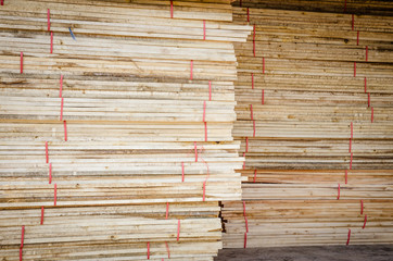 Stacked wood fence lumber