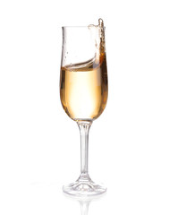 Champagne in a glass. Isolated on white background
