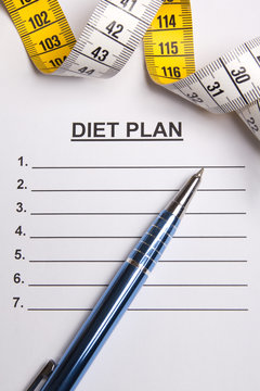 paper with blank diet plan, pen and measure tape