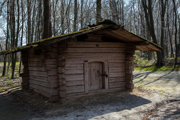 Old Ukrainian wooden house in the summer Pirogovo