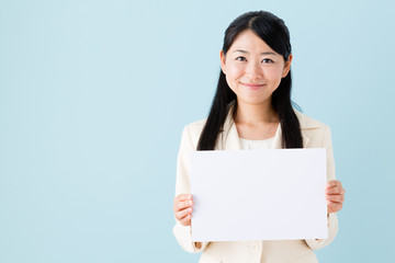 asian businesswoman on blue background