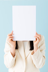 asian businesswoman on blue background