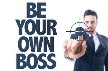 Business man pointing the text: Be Your Own Boss