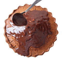 Top view of glazing a cake