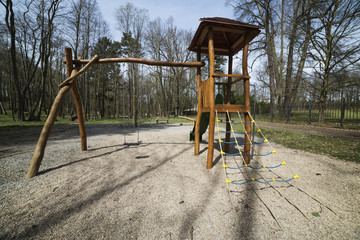 Fototapeta na wymiar playground with slides and climbing frame