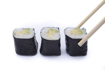 Hoso maki, abokado maki sushi with chopsticks