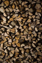 firewood / Dry firewood in a pile for furnace kindling